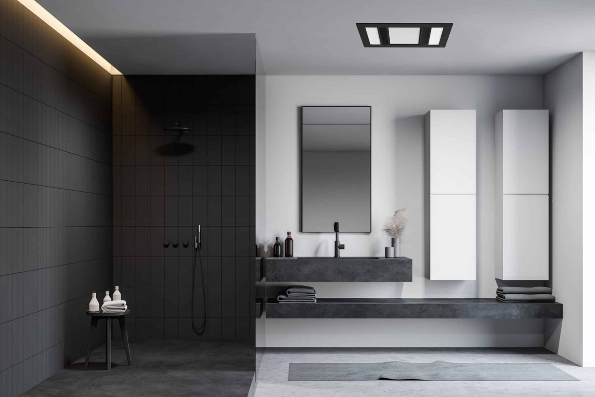 Martec Phoenix black bathroom heater installed in a bathroom